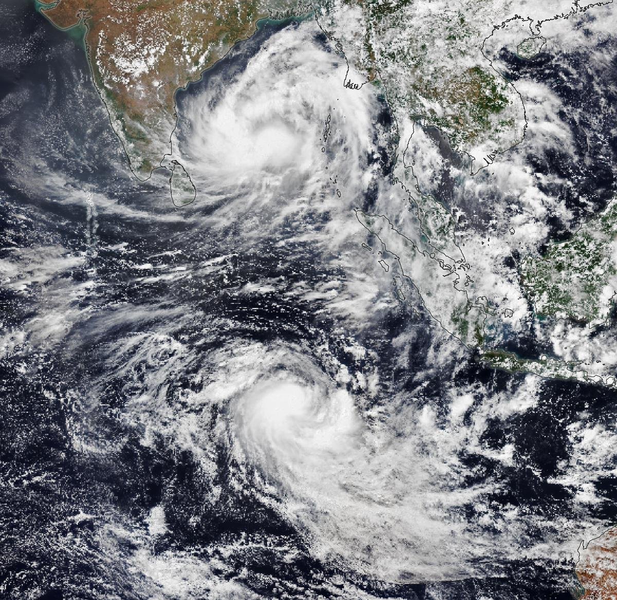Twin tropical cyclones Asani (northern hemisphere — counter-clockwise) & Karim (southern hemi-sphere — clockwise)